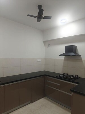 Kitchen in  Apartment at Geras World of Joy L, Kharadi – for Rent