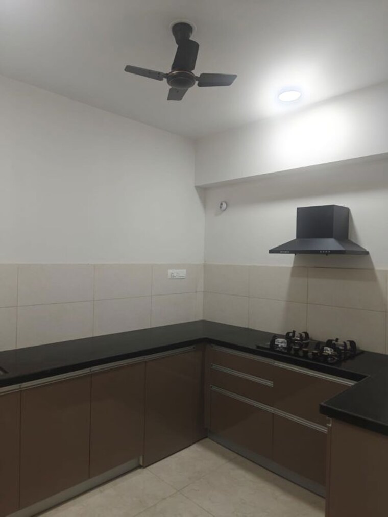 Kitchen, geras-world-of-joy-l  1600 Sq.Ft. Apartment In Kharadi Pune 10540825