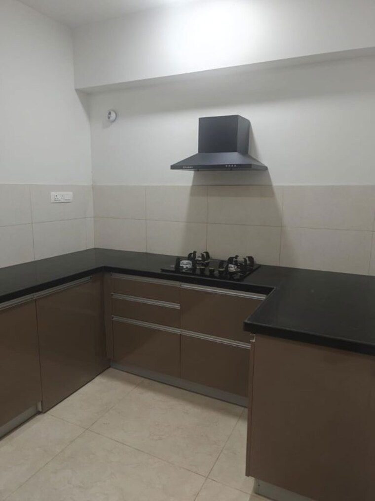 Kitchen, geras-world-of-joy-l  1600 Sq.Ft. Apartment In Kharadi Pune 10540825