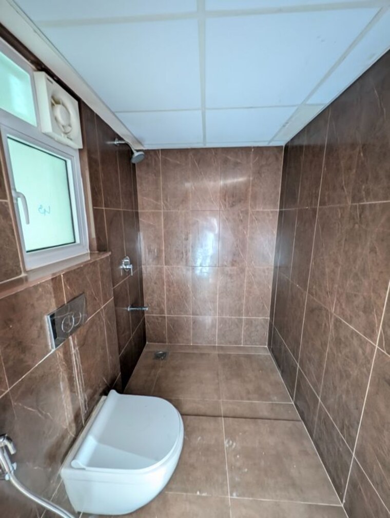 Bathroom, gera-world-of-joy  1200 Sq.Ft. Apartment In Kharadi Pune 10540950