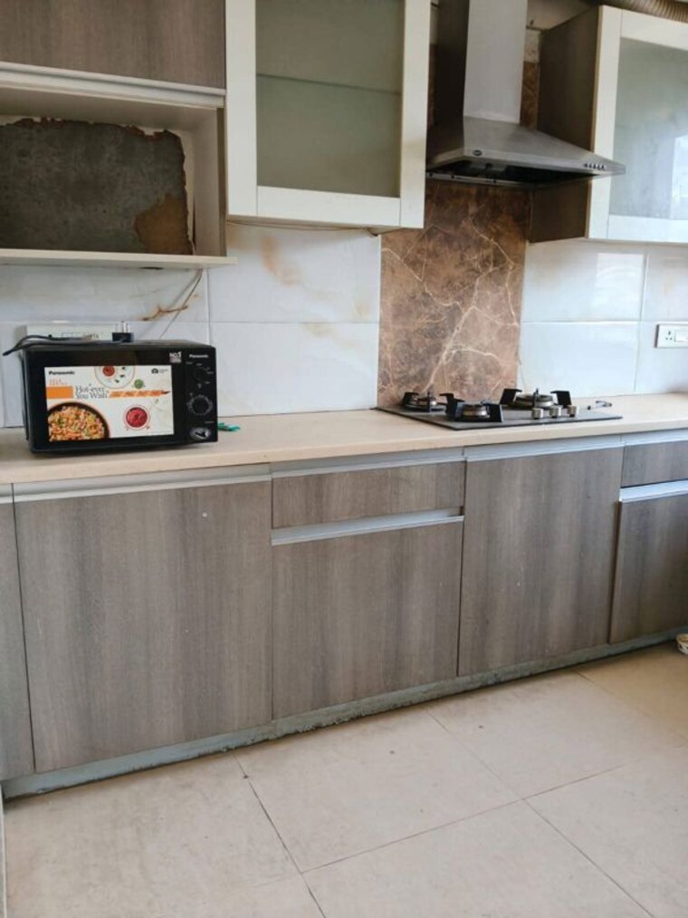 Kitchen, smart-world-orchard 3 Bedroom 1720 Sq.Ft. Apartment In Sector 61 Gurgaon 10541031