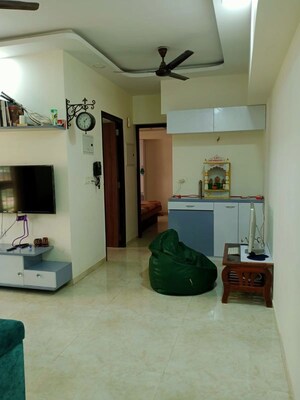 Living Room in 2 BHK Apartment at Lodha Amara, Kolshet Road – for Sale