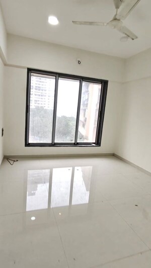Room in 2.5 BHK Apartment at Omkar Signet, Malad East – for Rent