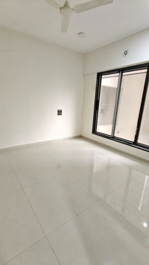 Room in 2.5 BHK Apartment at Omkar Signet, Malad East – for Rent