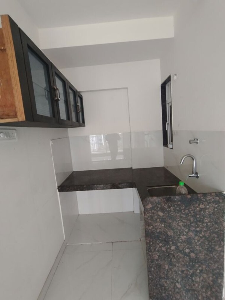 Kitchen, ace-courtyard 1 Bedroom 320 Sq.Ft. Apartment In Ghodbunder Road Thane 10541169