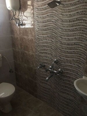 Bathroom in 1 BHK Apartment at Raunak Bliss, Ghodbunder Road – for Rent