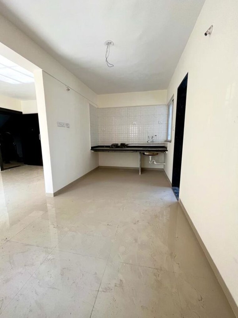 Kitchen, whistling-winds 2 Bedroom 1051 Sq.Ft. Apartment In Pisoli Pune 10541216