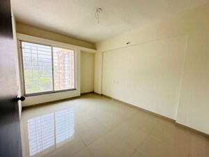 Bedroom in 2 BHK Apartment at Whistling Winds, Pisoli – for Sale