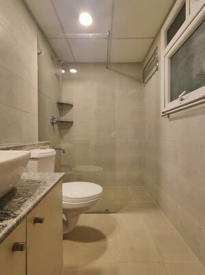 Bathroom in  Apartment at Bhartiya Nikoo Homes Phase 2, Thanisandra Main Road – for Rent
