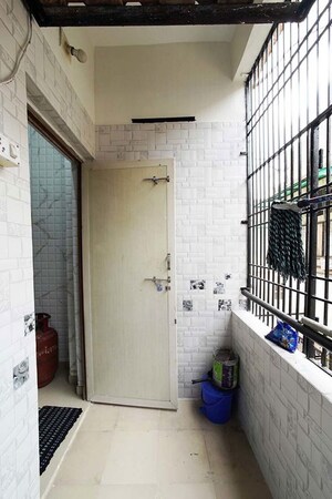 Kitchen in 2 BHK Apartment at Ghatlodia – for Sale