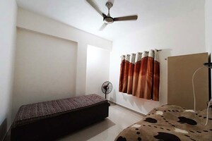 Living Room in 2 BHK Apartment at Ghatlodia – for Sale