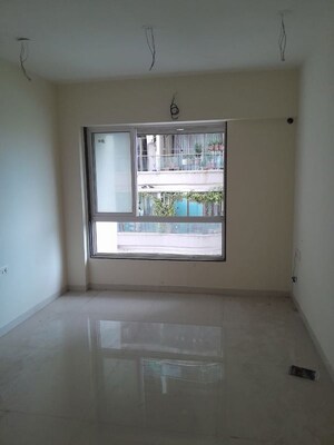 Room in 2 BHK Apartment at Triumph Omkareshwar CHS, Borivali East – for Sale