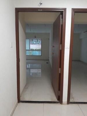Building Lobby in 2 BHK Apartment at Triumph Omkareshwar CHS, Borivali East – for Sale