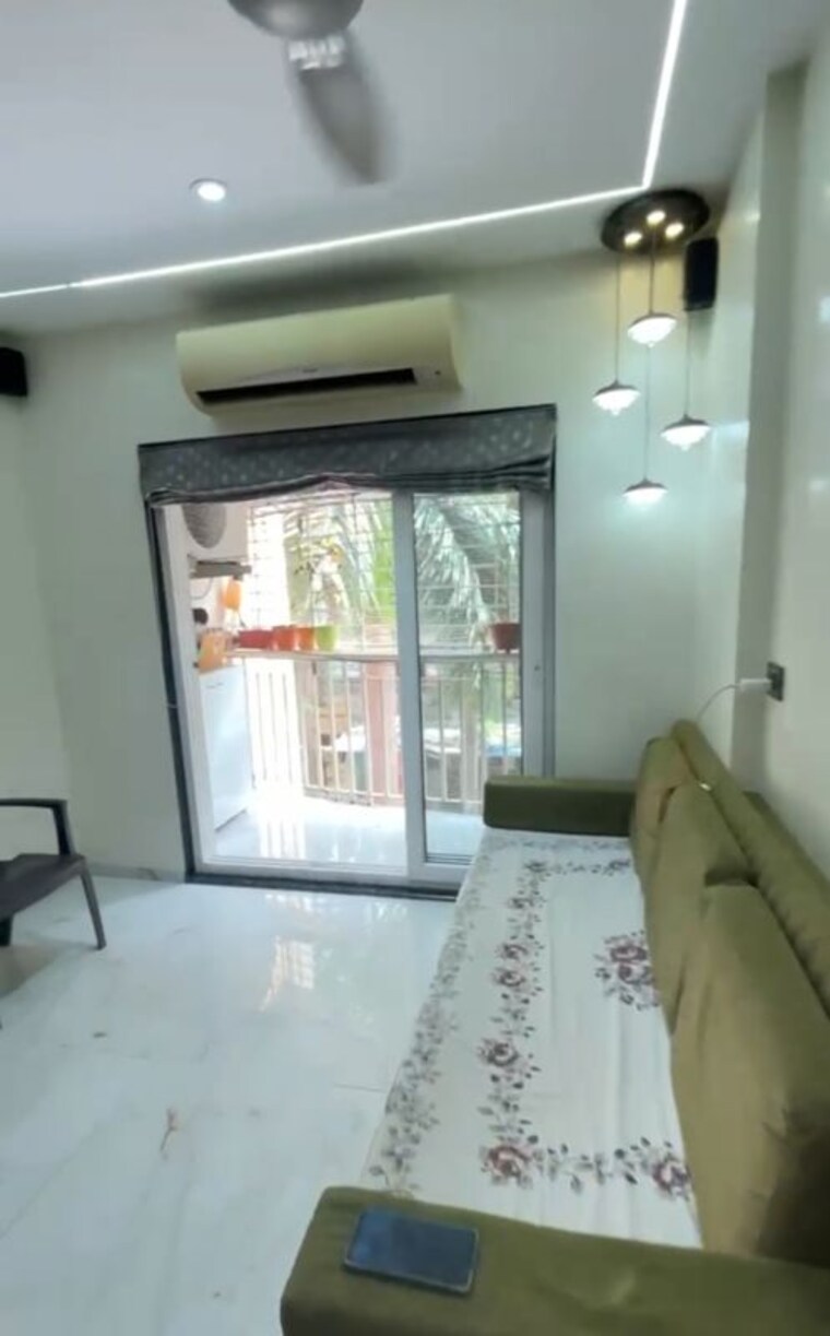 Living Room, happy-home-heights 2 Bedroom 710 Sq.Ft. Apartment In Mira Road Thane 10541421