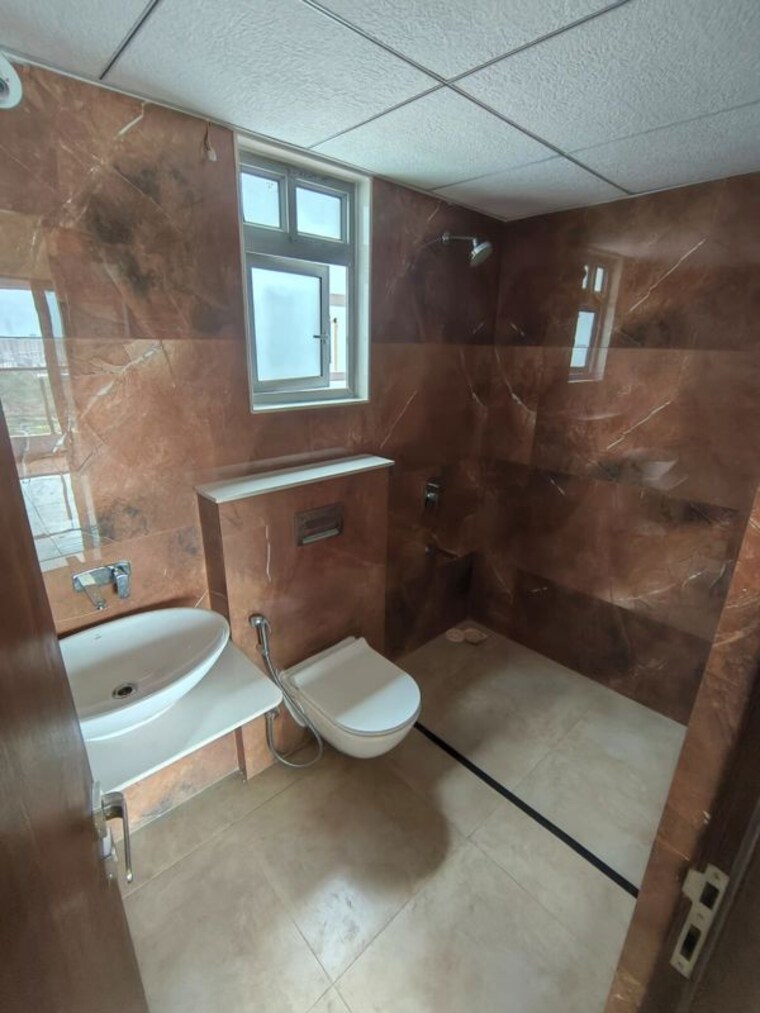 Bathroom, kolte-patil-life-republic-aros 2 Bedroom 836 Sq.Ft. Apartment In Hinjewadi Pune 10541504