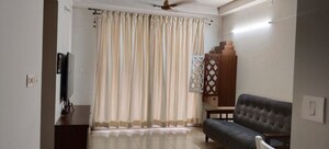 Living Room in 2 BHK Apartment at Bhartiya City Nikoo Homes II, Thanisandra Main Road – for Rent