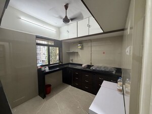 Kitchen in 2 BHK Apartment at Takshila CHS, Andheri East – for Rent
