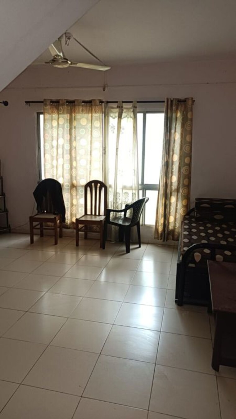 Living Room, nirmal-township-a 2 Bedroom 1150 Sq.Ft. Villa In Hadapsar Pune 10541711