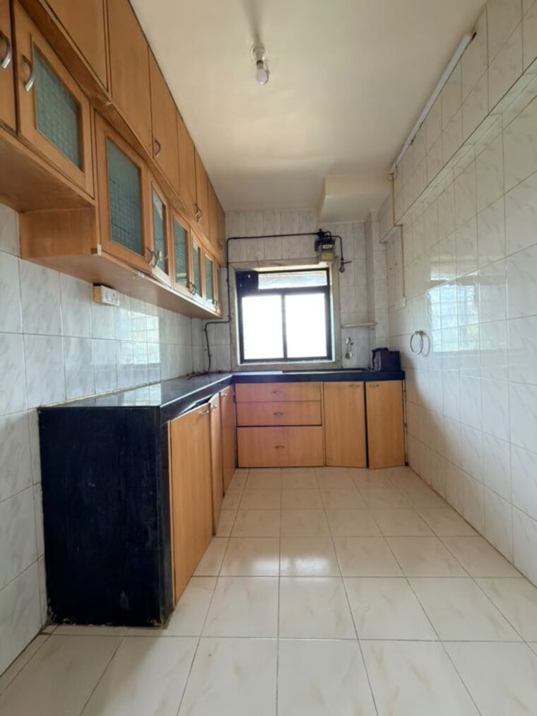 Kitchen, national-coral-crest 2 Bedroom 1100 Sq.Ft. Apartment In Nerul Navi Mumbai 10541703