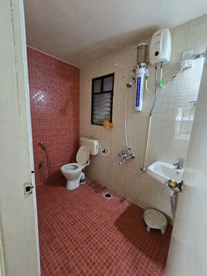 Bathroom in 2 BHK Apartment at Mittal Brothers Whistling Palms, Wakad – for Rent