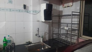 Kitchen in 1 BHK Apartment at Vishwakarma Tower, Kharghar – for Rent