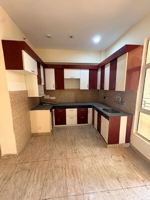 Kitchen in 3 BHK Apartment at Divyansh Flora, Sector 16c Greater Noida – for Rent