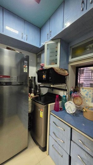 Kitchen in 2 BHK Apartment at Lokhandwala Green Acres, Andheri West – for Rent