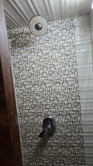 Bathroom in 2 BHK Apartment at Lokhandwala Green Acres, Andheri West – for Rent