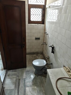 Bathroom in 3 BHK Builder Floor at Mahendru Enclave – for Rent