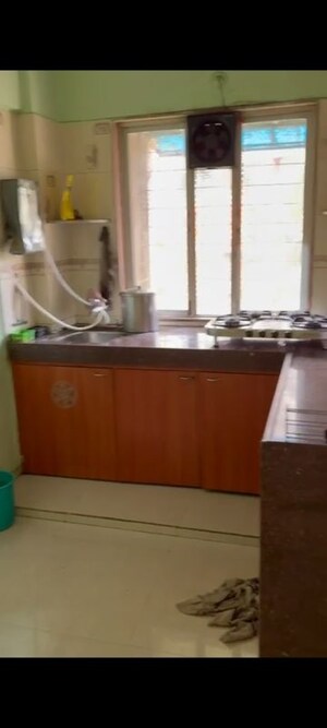 Kitchen in 1 BHK Apartment at Riddhi Garden, Malad East – for Rent
