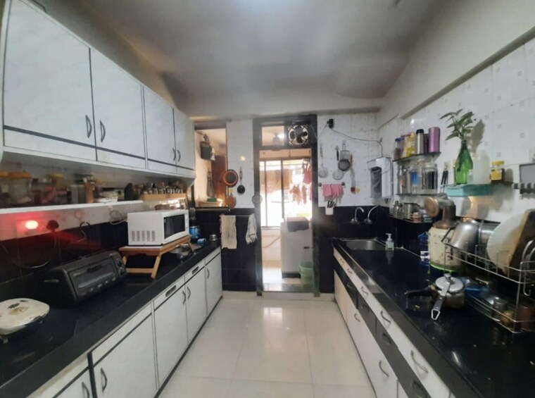 Kitchen, riddhi-tower 3 Bedroom 850 Sq.Ft. Apartment In Malad East Mumbai 10541999