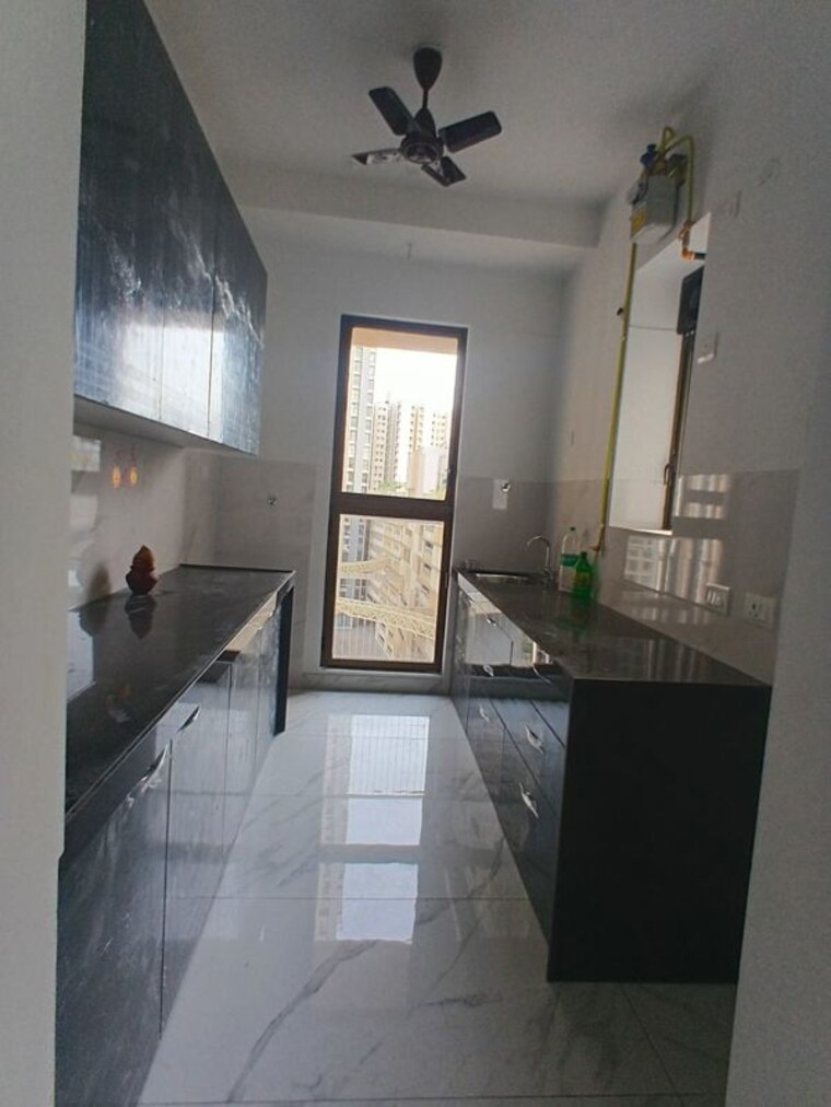 Kitchen, kalpataru-immensa 2 Bedroom 663 Sq.Ft. Apartment In Kolshet Road Thane 10542091