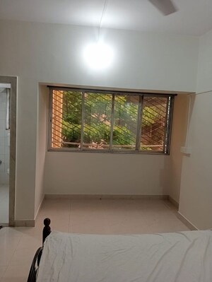 Room in 2 BHK Apartment at Bandra West – for Rent