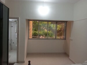 Room in 2 BHK Apartment at Bandra West – for Rent