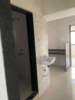 Building Lobby in 1 BHK Apartment at Wadgaon Sheri – for Rent