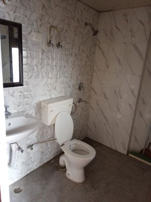 Bathroom in 2 BHK Apartment at Mehak Jeevan, Raj Nagar Extension – for Sale