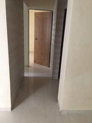 Building Lobby in 1 BHK Apartment at Neelam Heights, Kharghar Sector 13 – for Rent