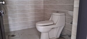 Bathroom in 2 BHK Apartment at SG Impressions 58, Raj Nagar Extension – for Sale