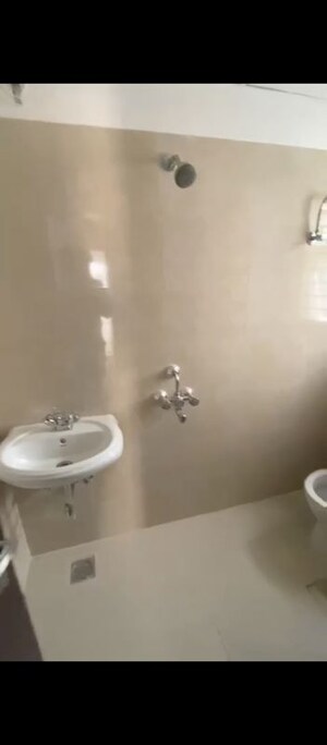 Bathroom in 3 BHK Builder Floor at BPTP Park Towers, Sector 77 – for Sale