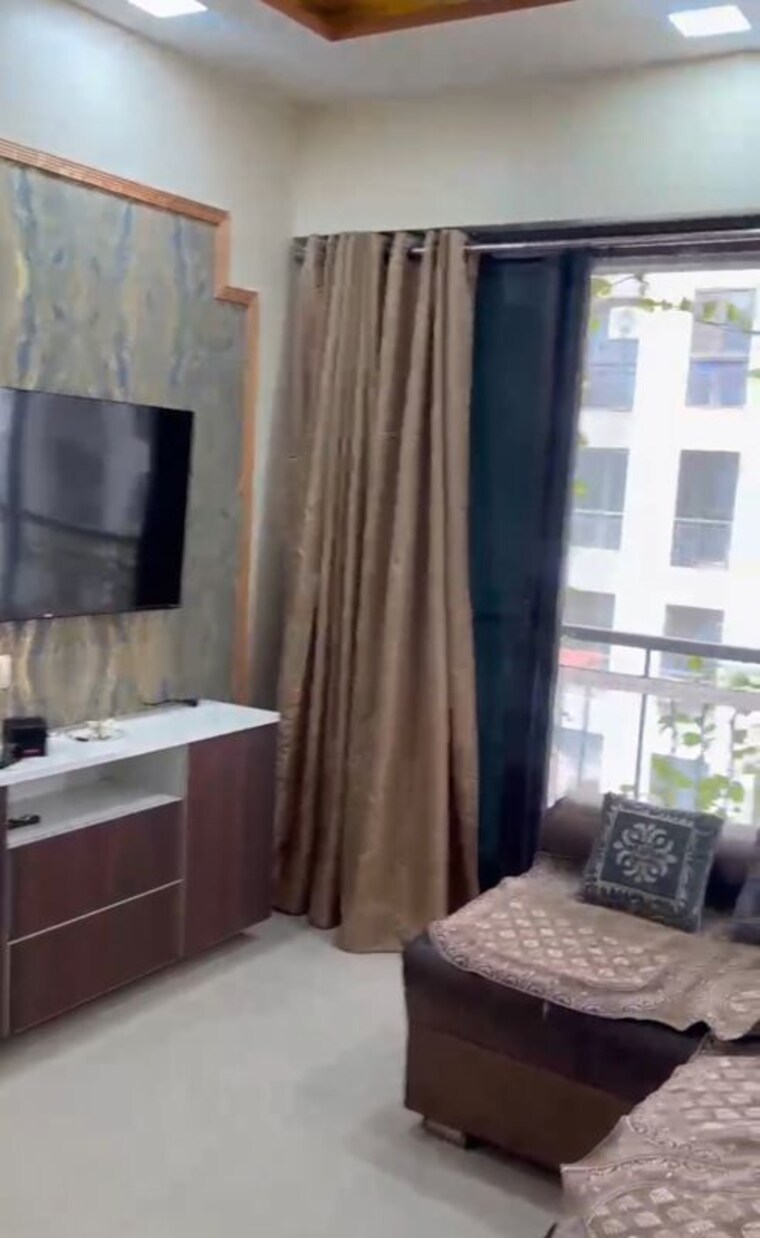 Living Room, man-opus 2 Bedroom 610 Sq.Ft. Apartment In Mira Road Thane 10542425