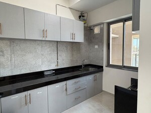 Kitchen in 2 BHK Apartment at Sheth Auris Bliss, Malad West – for Rent