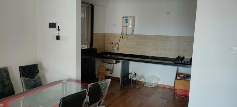 Kitchen, unique-k-town 3 Bedroom 1200 Sq.Ft. Apartment In Kiwale Pune 10542590