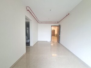 Living Room in 2 BHK Apartment at Dosti Tulip, Balkum Pada – for Sale