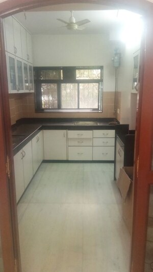 Kitchen in 1 BHK Apartment at Unique Tower, Sion – for Rent