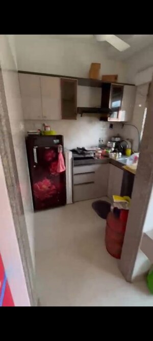 Kitchen in 2 BHK Apartment at Ruparel Sky Green, Kandivali West – for Rent