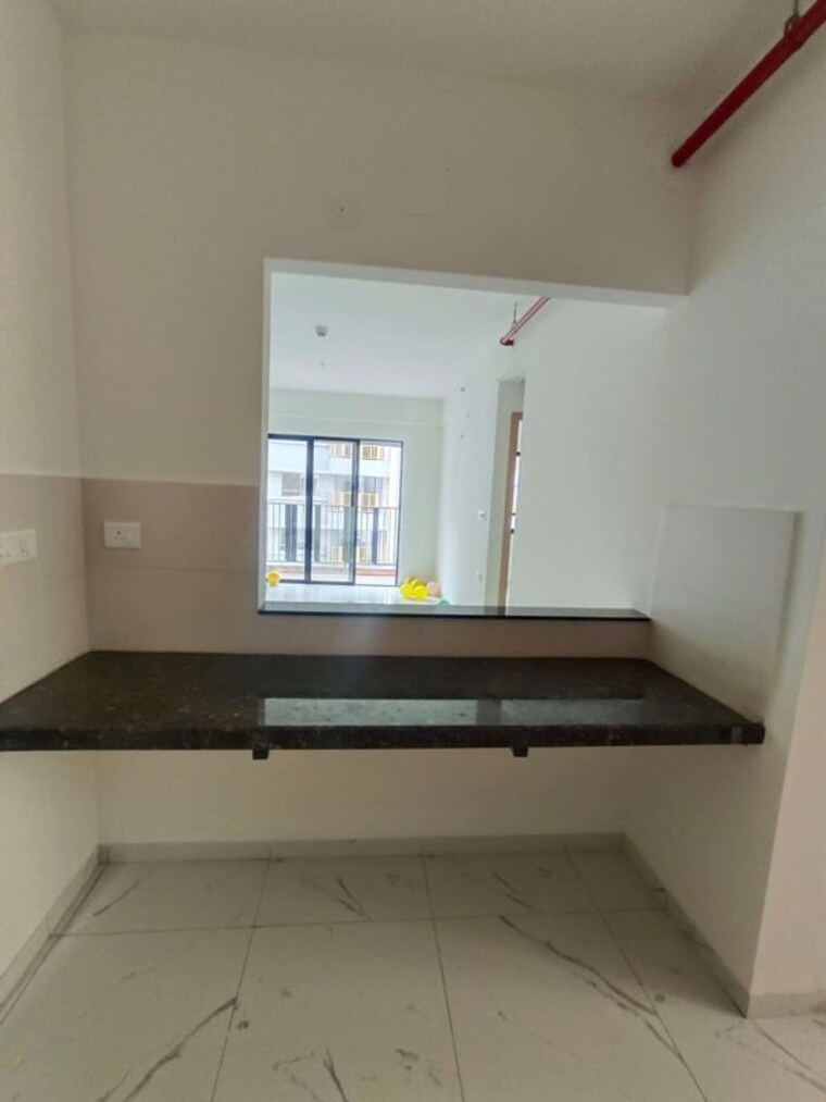 Kitchen, mahindra-nestalgia 2 Bedroom 1000 Sq.Ft. Apartment In Pimpri Pune 10542799