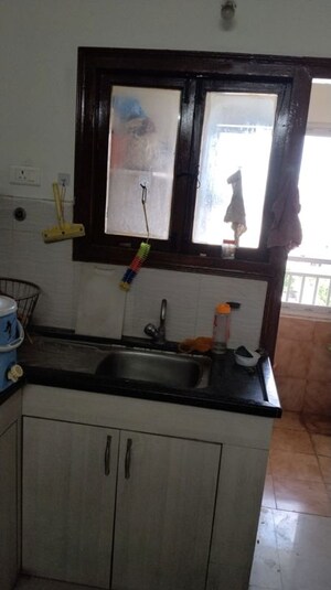 Kitchen in 2 BHK Apartment at Theme Ambience Golf View, Gachibowli – for Rent