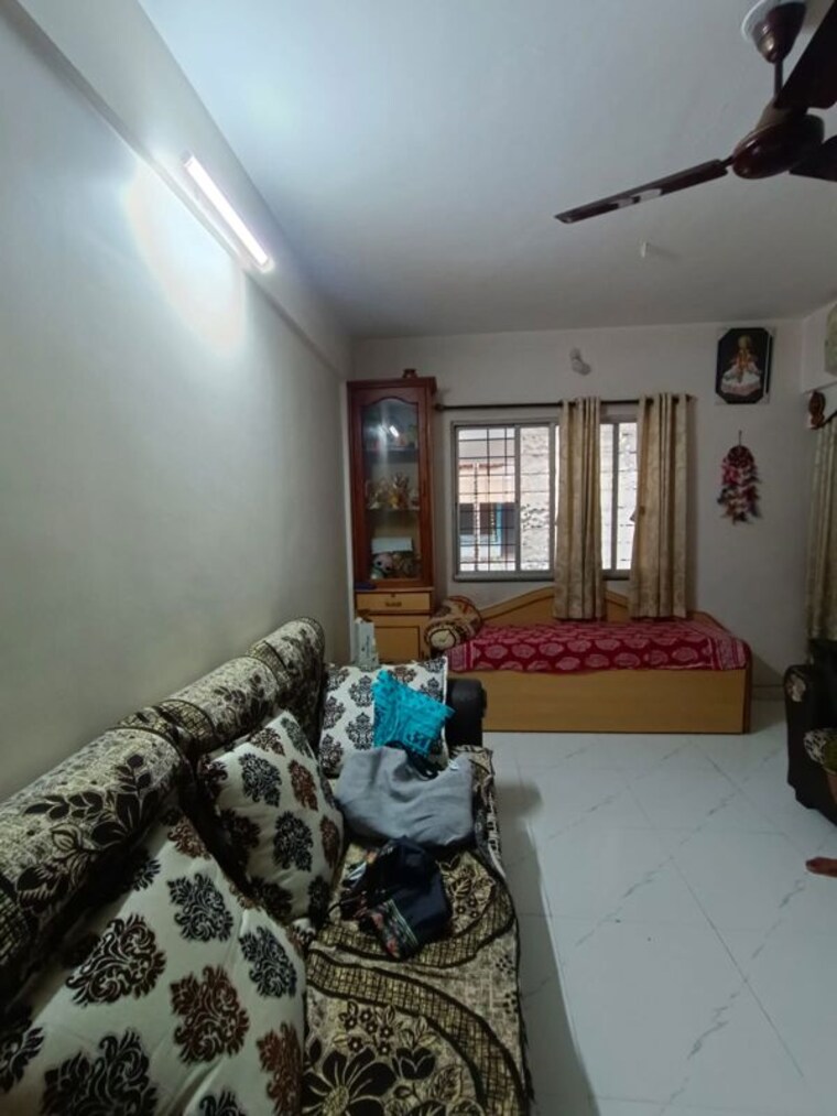 Living Room, kute-vrundavan-society 2 Bedroom 1000 Sq.Ft. Apartment In Akurdi Pune 10542840