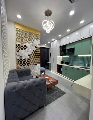 Living Room in 2 BHK Apartment at Supertech Supernova Nova Residences, Sector 94 – for Sale