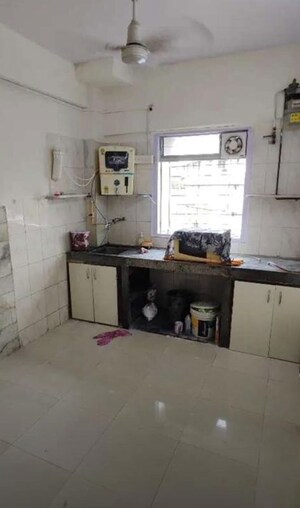 Kitchen in 2 BHK Apartment at Jai Ganesh CHS JB Nagar, Jb Nagar – for Rent